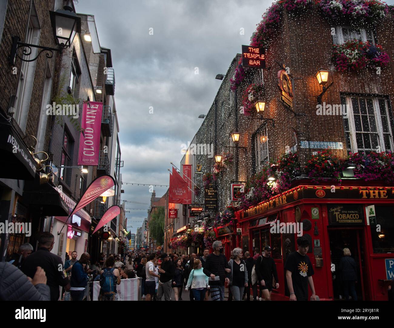 Ireland, Dublin, June 20 2022 People outside the famous Irish pub The