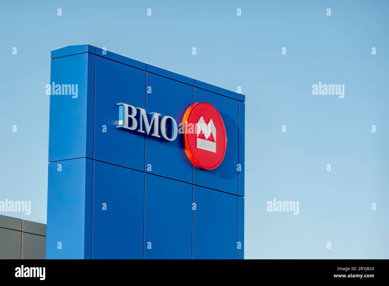 Calgary, Alberta, Canada. Mar 17, 2023. A BMO Bank of Montreal sing on a branch building. Stock Photo