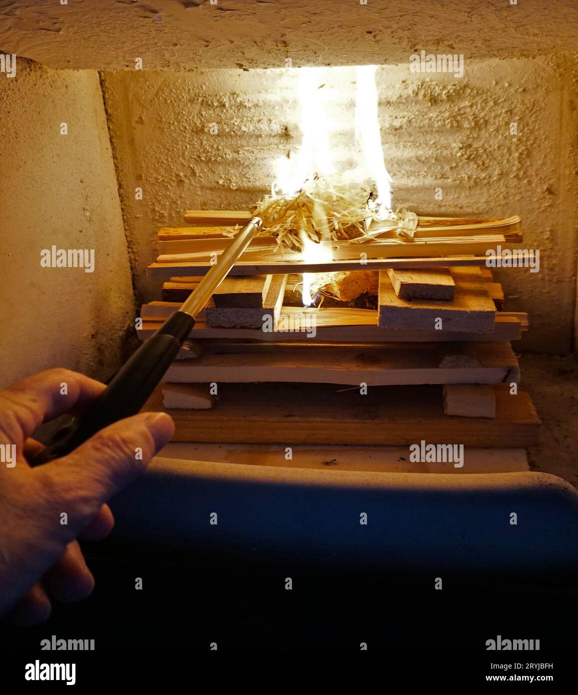 Woodburning stove, example of properly lighting a fireplace Stock