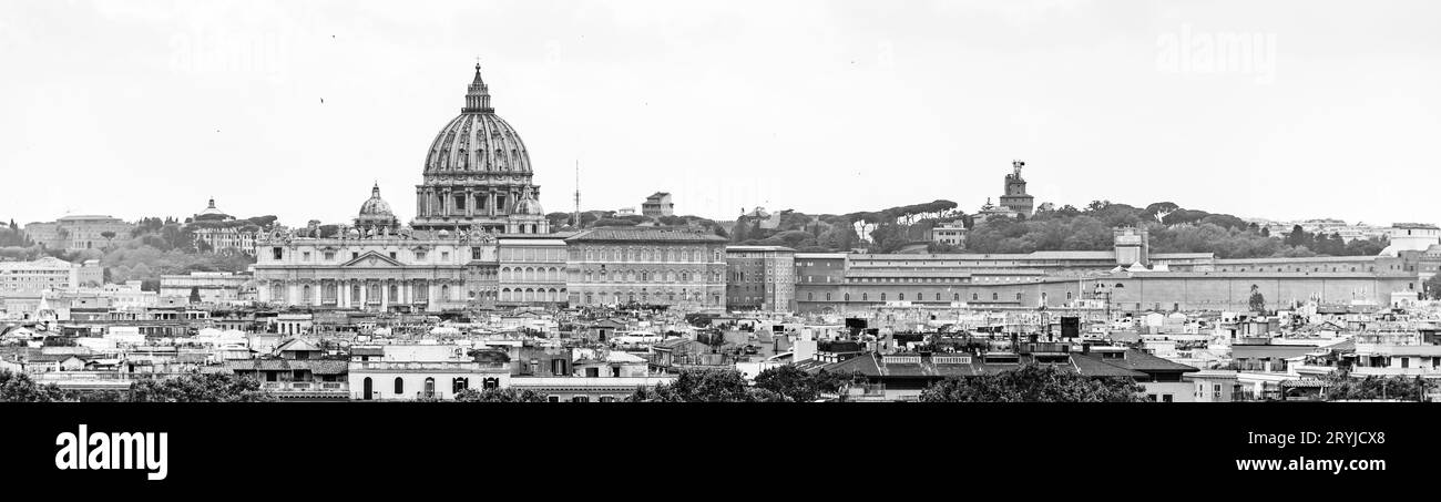 Vatican City with St. Peter's Basilica. Panoramic skyline view from Castel Sant'Angelo, Rome, Italy. Black and white image. Stock Photo