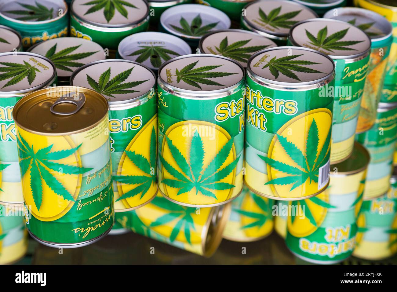 Cans with cannabis seeds for sale on a market in Amsterdam Stock Photo