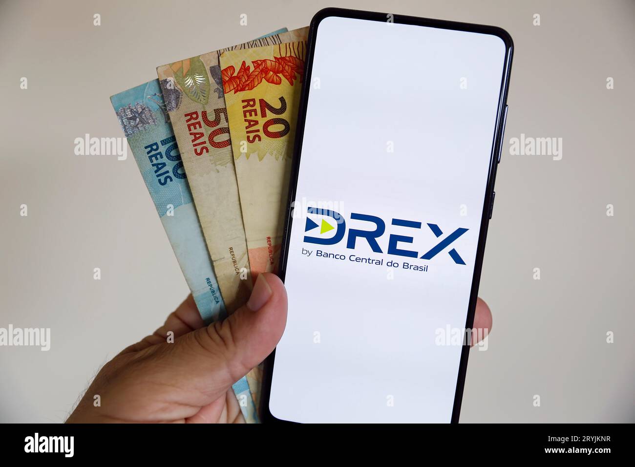 Minas Gerais, Brazil - October 01, 2023: illustrative image of the real digital currency of Brazil DREX on the cell phone screen Stock Photo