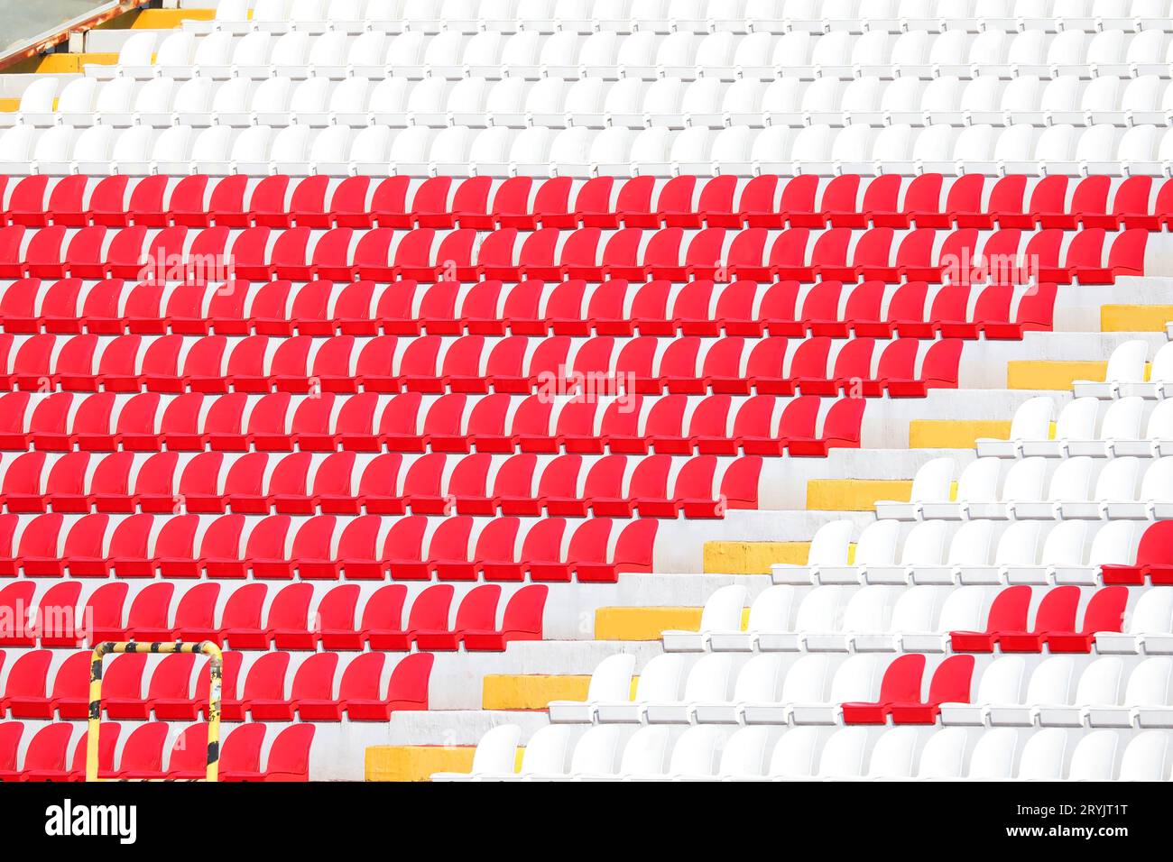 stands with white and red seats completely empty before the sporting