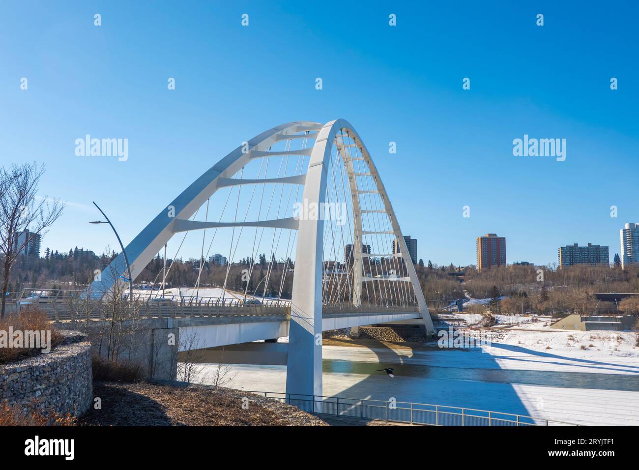 Edmonton, Alberta, Canada. Apr 3, 2023. Side view to the Walterdale Bridge in the morning with blue sky during winter.A through Stock Photo