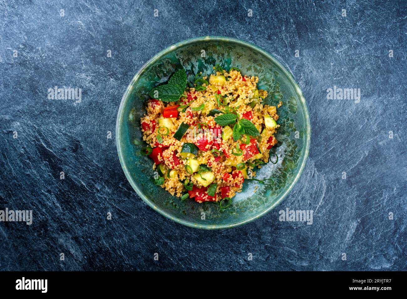 Traditional Moroccan vegetable couscous with zucchini and paprika