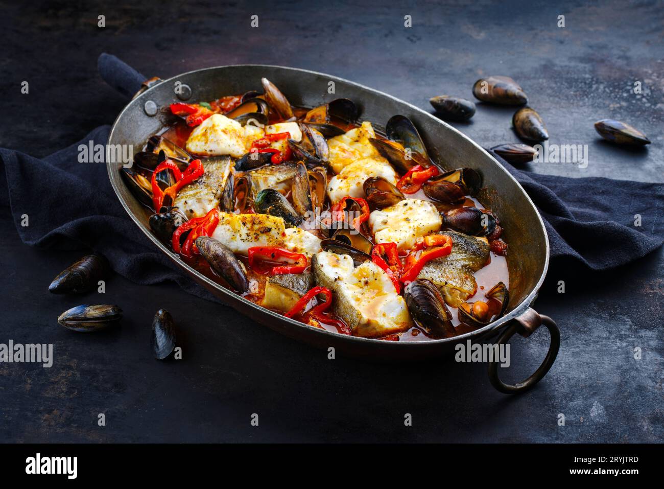 French Cod Fish Whole Traditional French seafood bouillabaisse with cod fish and mussels in ...