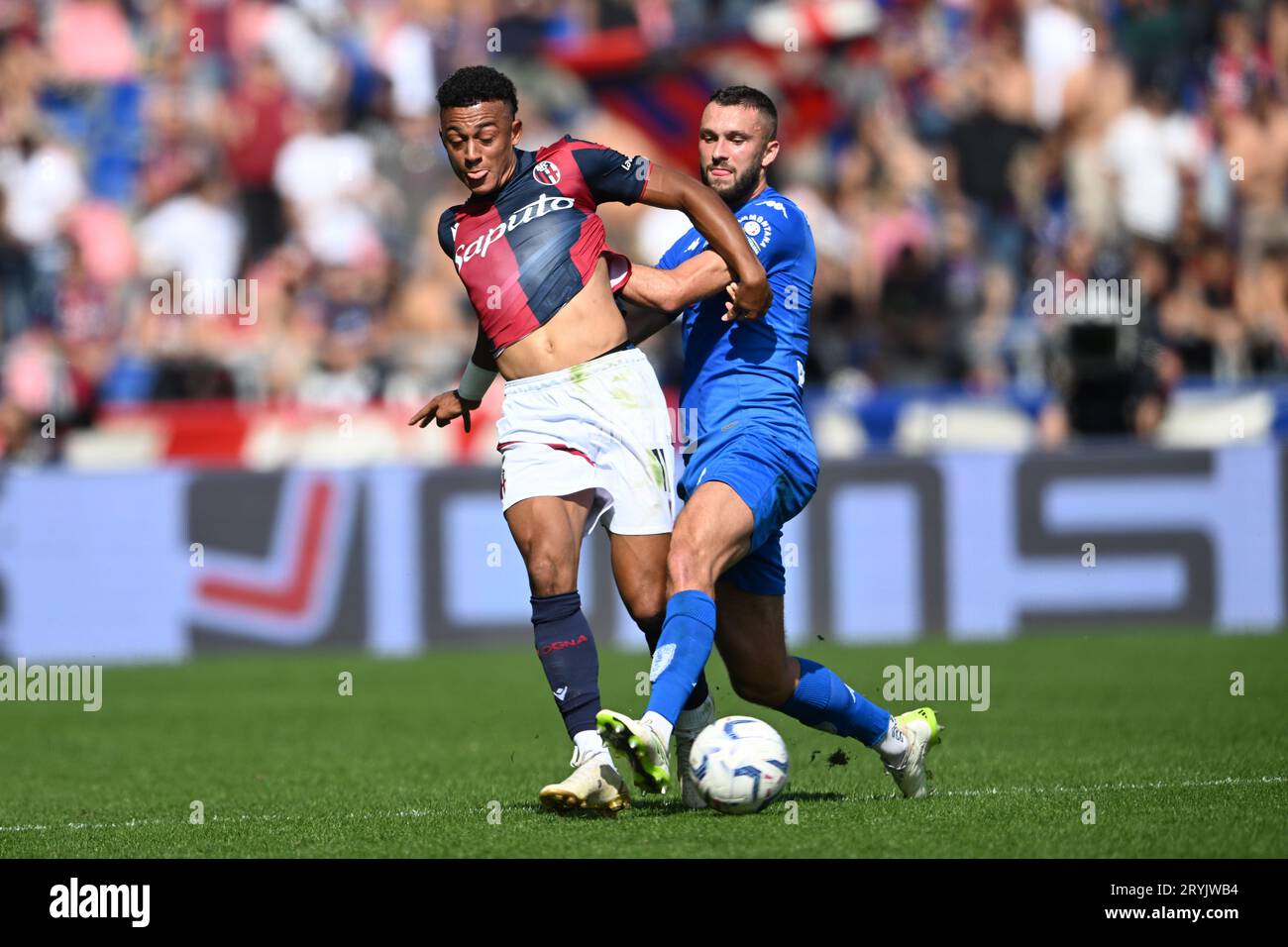 Dan Ndoye (Bologna) Sebastian Walukiewicz (Empoli) during the Italian