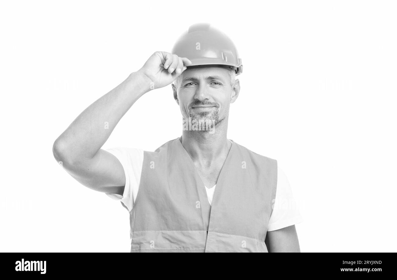 photo of happy man laborer wearing reflective vest. man laborer isolated on white. Stock Photo