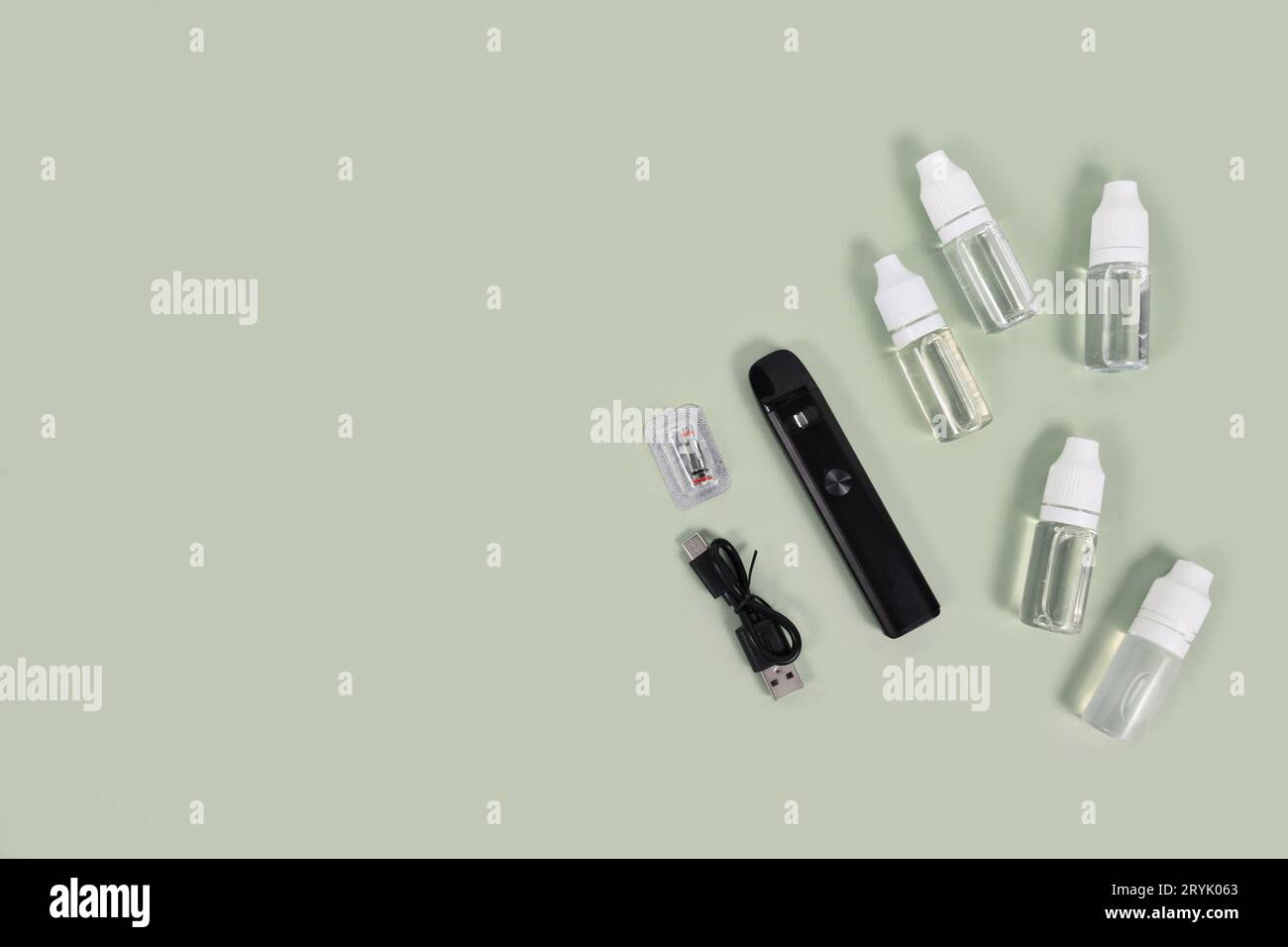 Bottles with liquid solutions for electronic cigarettes with tools Stock Photo