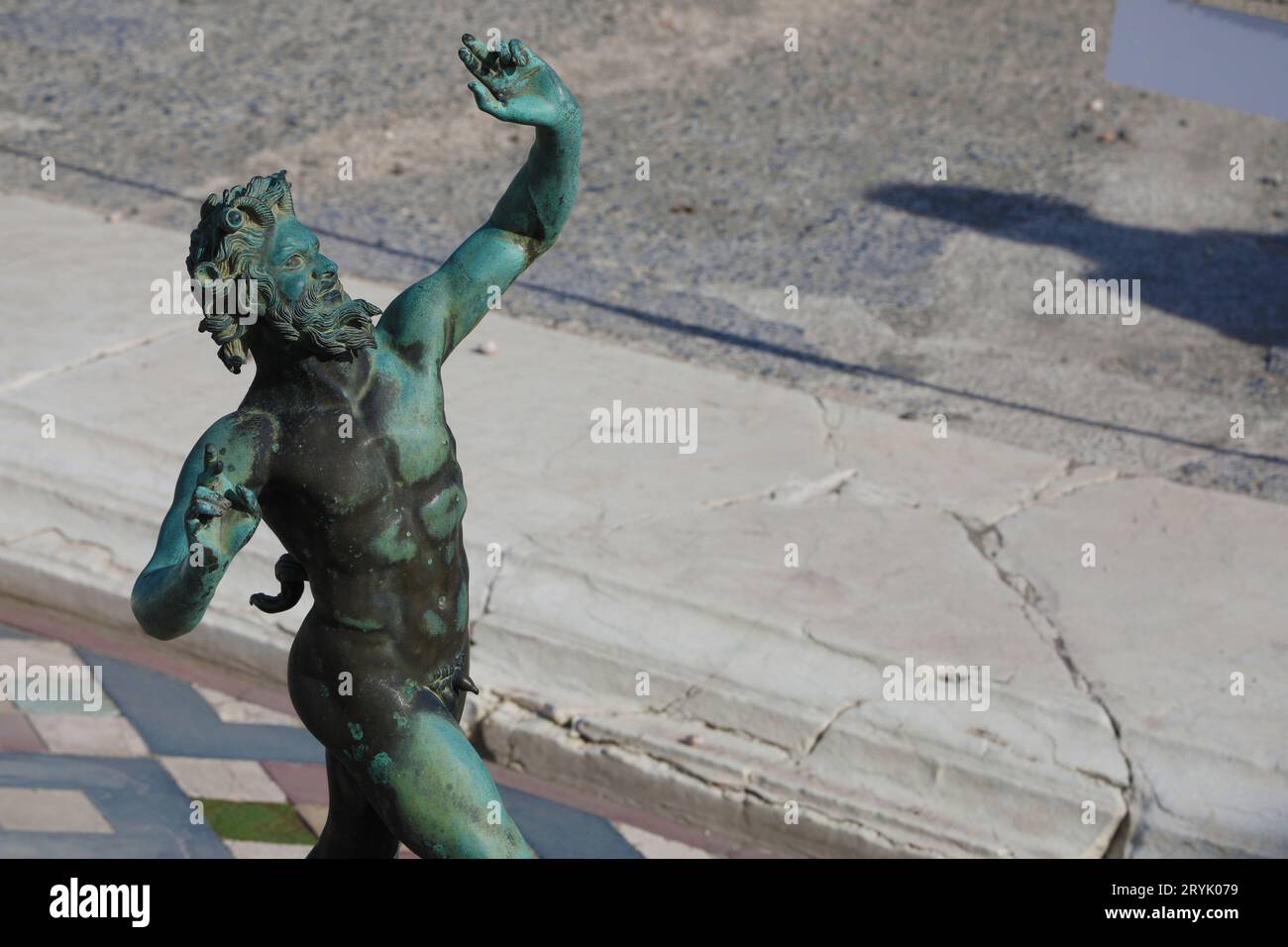 Detail from antique statue of the dancing faun in Pompeii, Italy Stock Photo