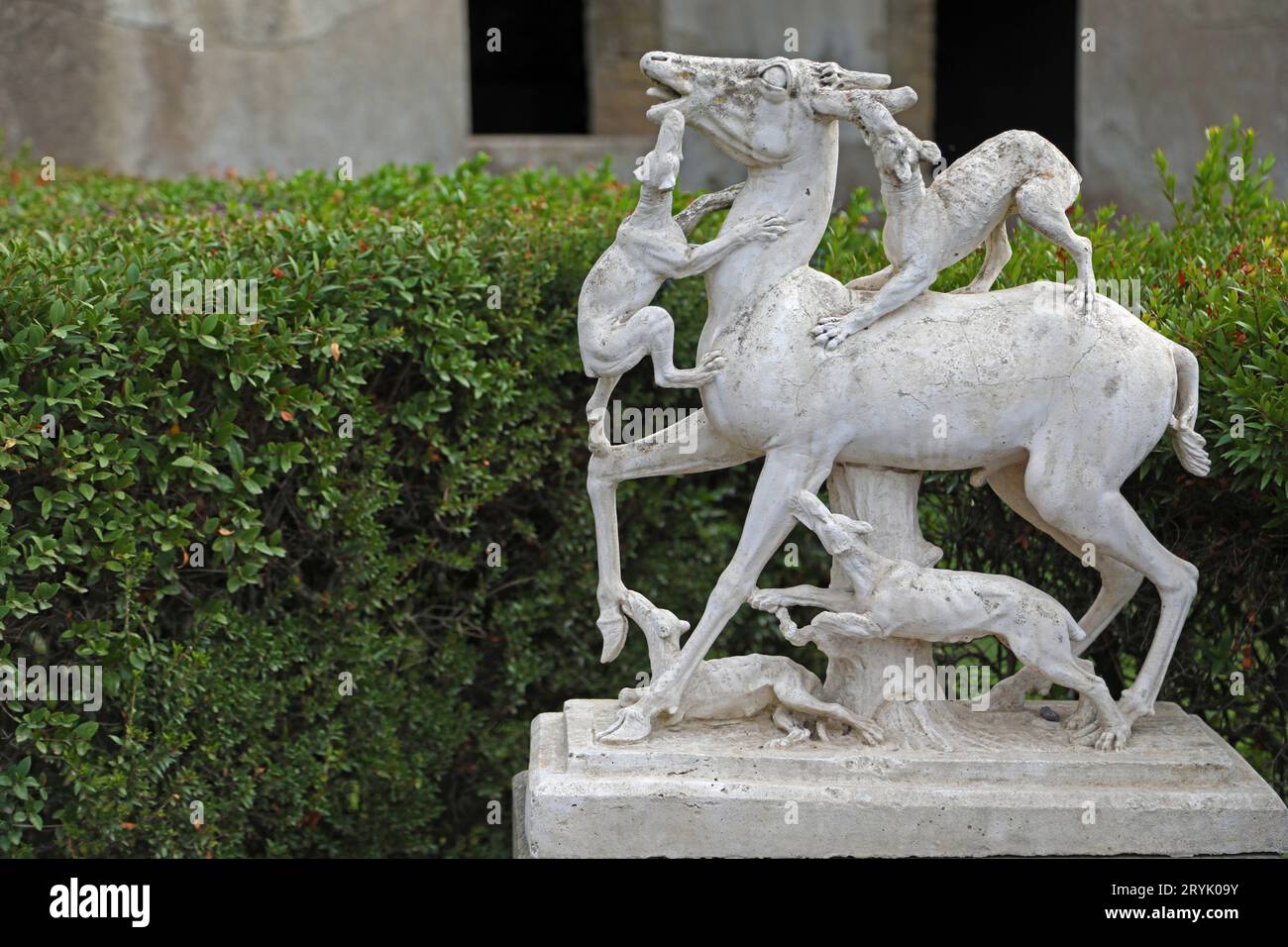 Statue of a deer attacked by dogs in Ercolano, Italy Stock Photo