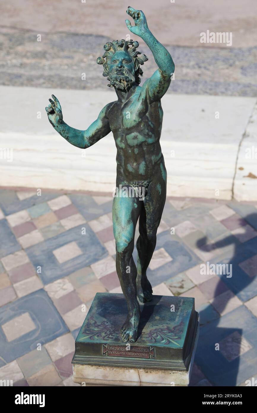 Statue of the dancing faun in Pompeii, Italy Stock Photo