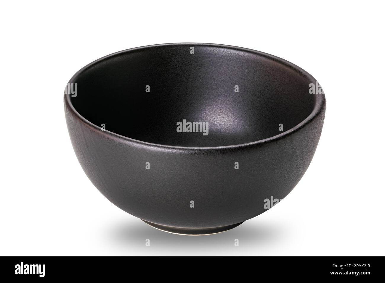 Empty black ceramic bowl isolated on white background. Stock Photo