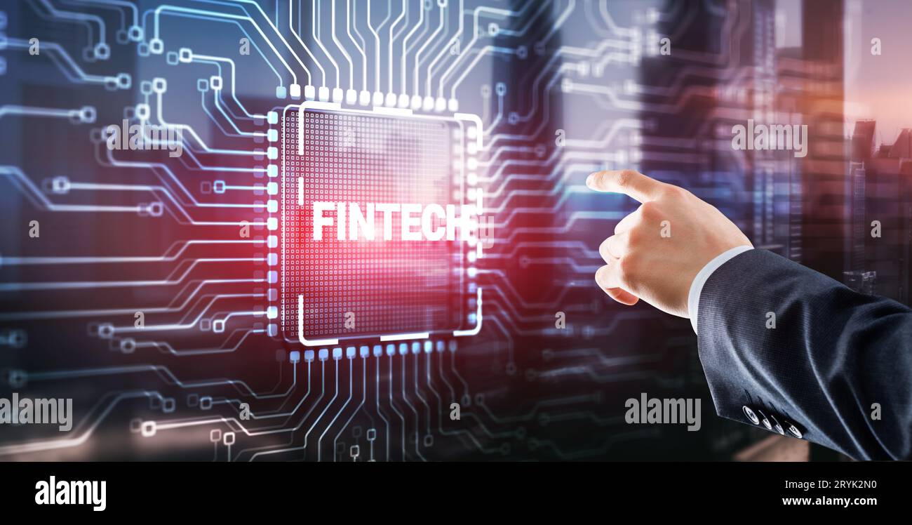 Tapping on the inscription Fintech financial technology digital money internet banking concept. Stock Photo