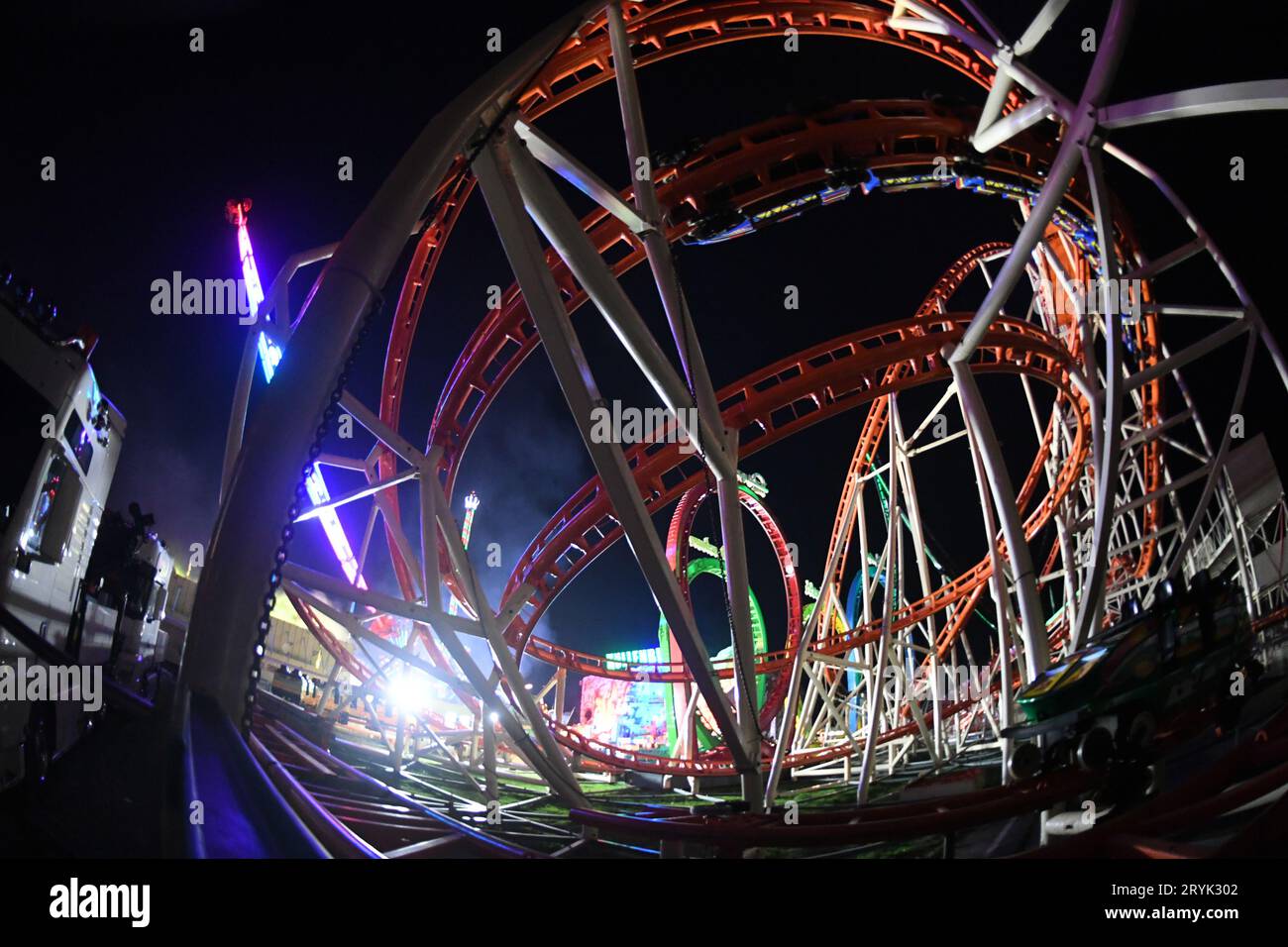 Munich, Germany. 01st Oct, 2023. Wiesn visitors ride the Olympia Looping roller coaster at the Oktoberfest. The 188th Wiesn will be held until 03.10.2023. Credit: Felix Hörhager/dpa/Alamy Live News Stock Photo