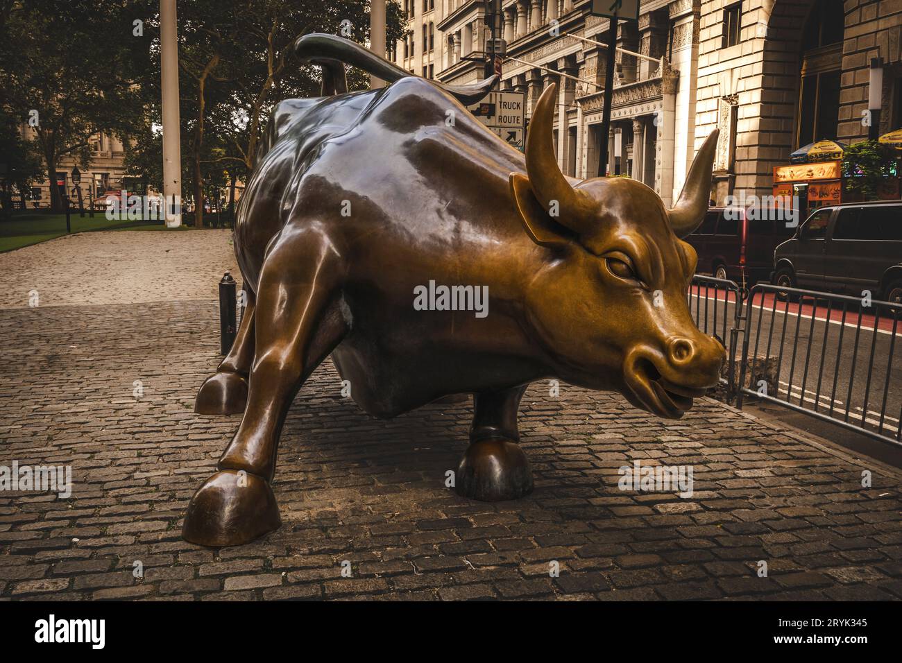 BOWLING GREEN, NEW YORK, USA - SEPTEMBER 16, 2023.  The iconic Charging Bull of Wall Street in the Lower manhattan Financial District Stock Photo