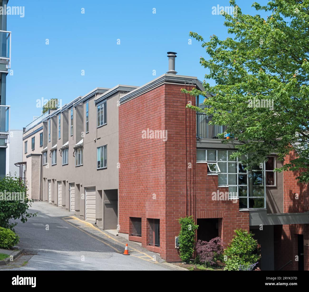 Back street driveway in residential area of Vancouver Stock Photo