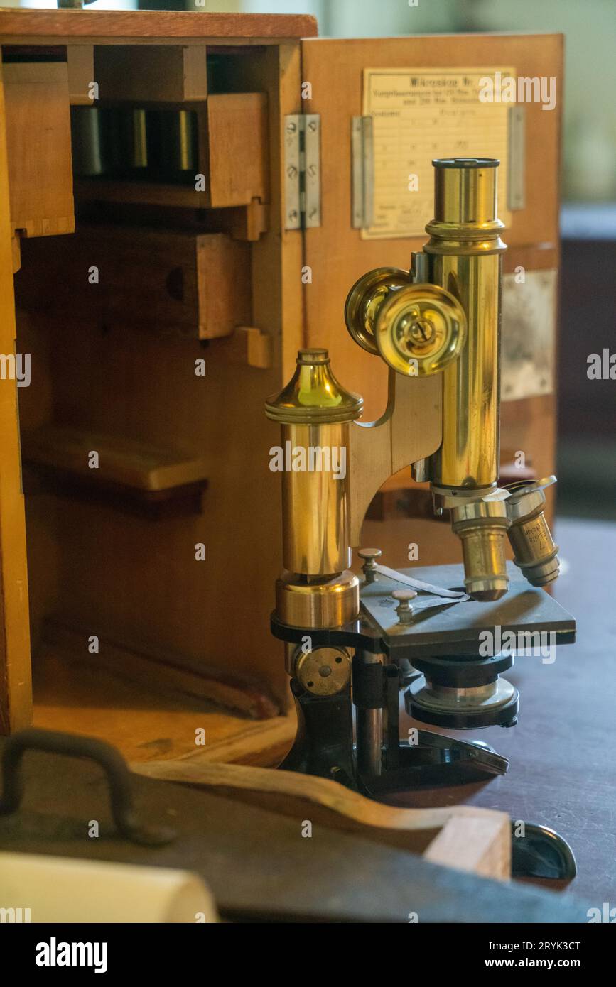 Microscope in the laboratory of the historic pulp mill Kistefoss, Norway Stock Photo