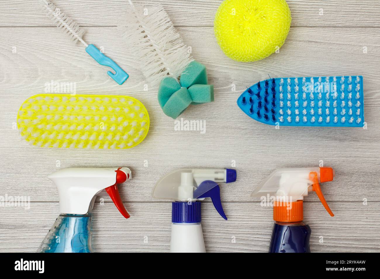 Water sprayers, color synthetic sponges for cleaning and dust brushes. Stock Photo