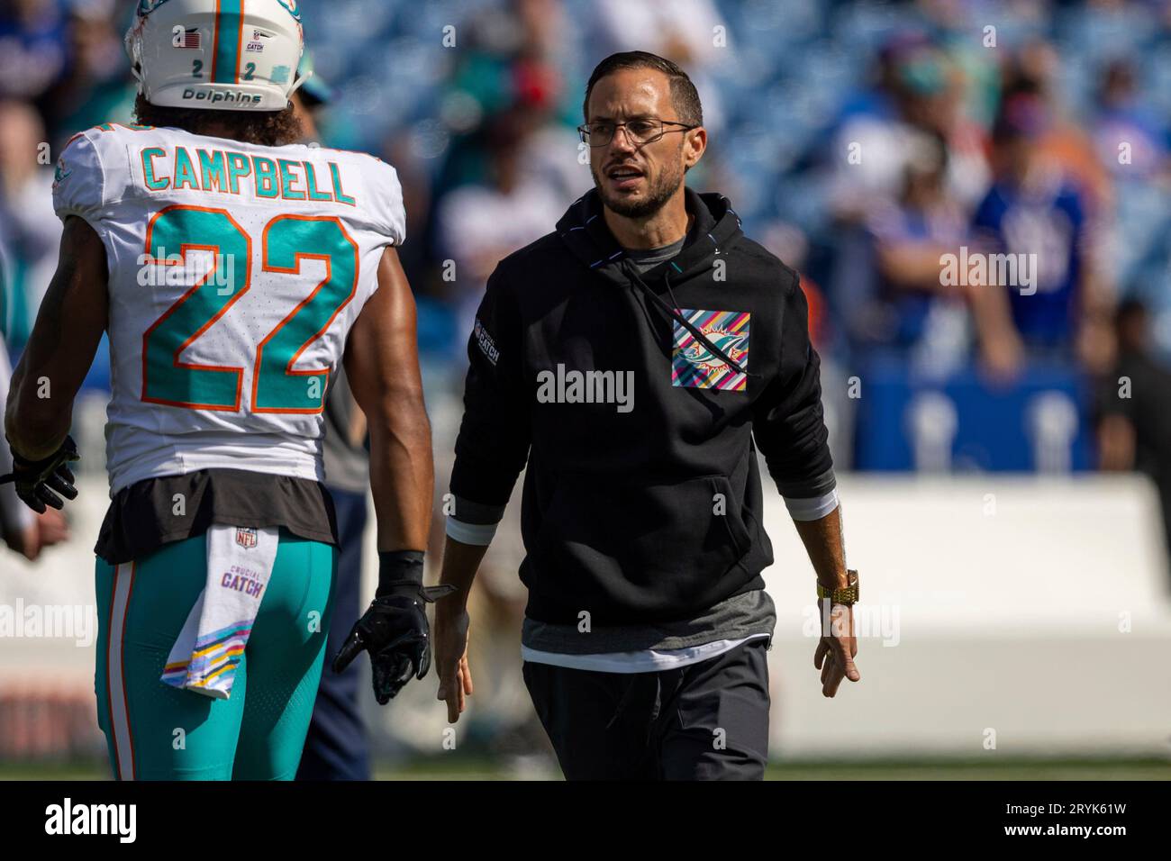 Miami Dolphins head coach Mike McDaniel walks on the field before an