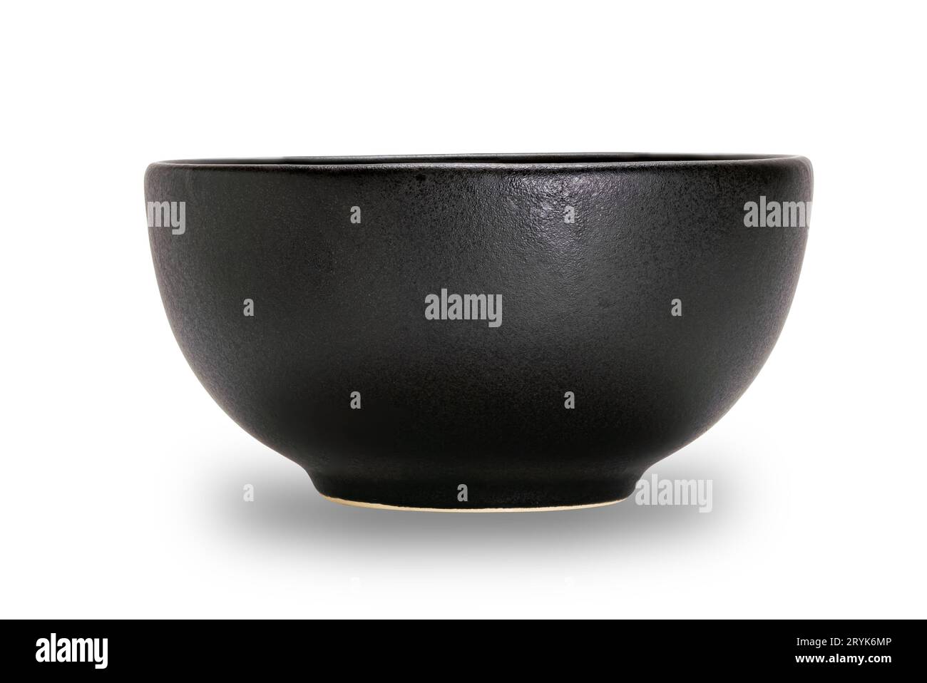 Empty single black ceramic bowl isolated on white background. Stock Photo