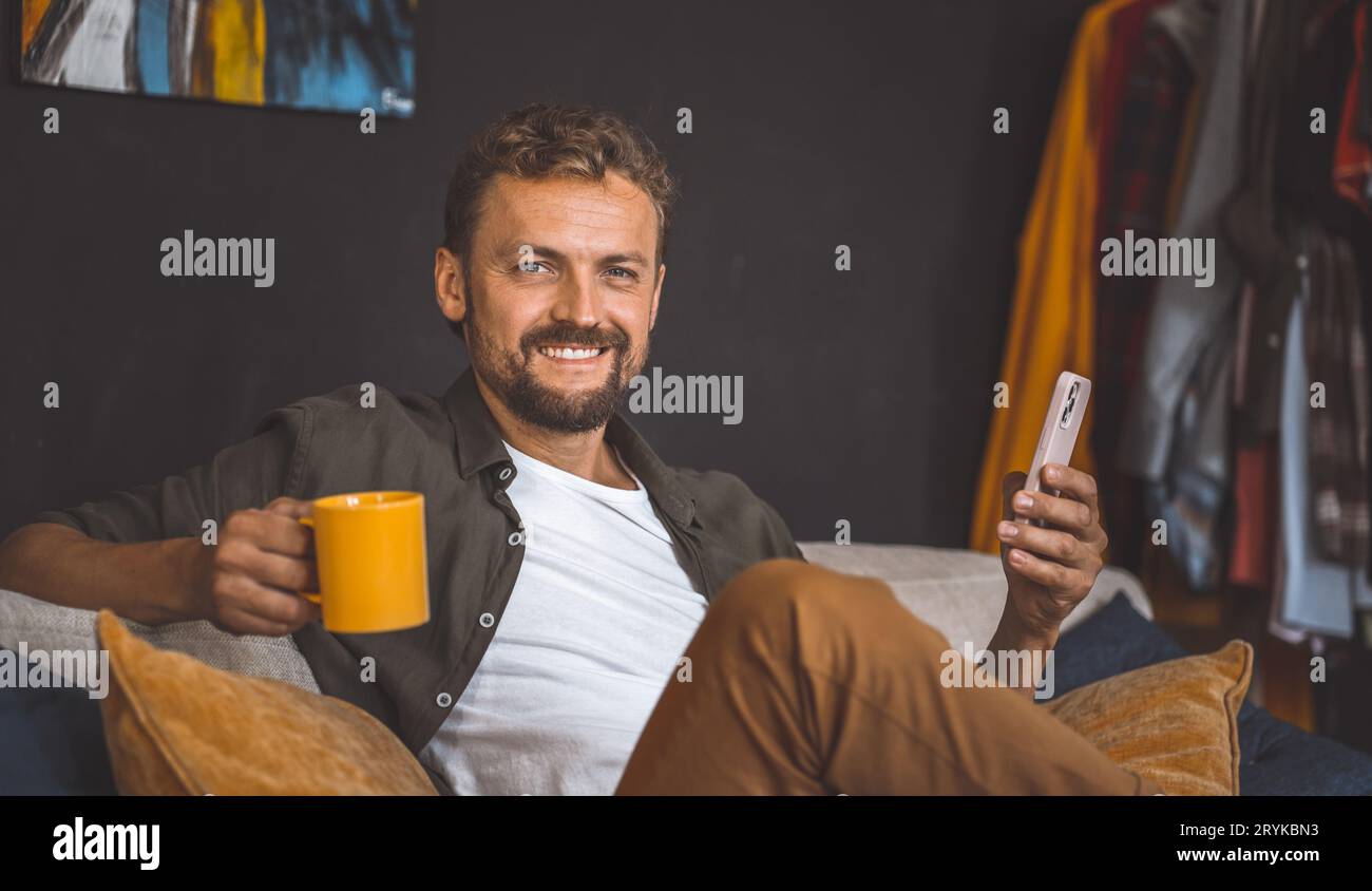 Enjoying digital content hi-res stock photography and images - Alamy