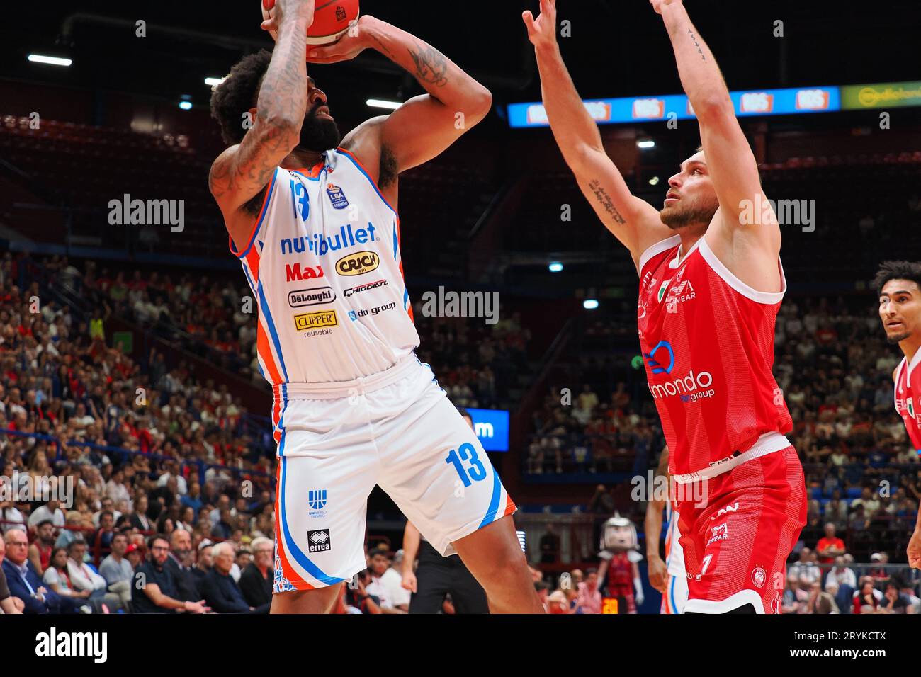 Milan, Italy. 01st Oct, 2023. James Young (Nutribullet Treviso Basket)  thwarted by Stefano Tonut (EA7 Emporio Armani Olimpia Milano) during EA7  Emporio Armani Milano vs Nutribullet Treviso Basket, Italian Basketball  Serie A