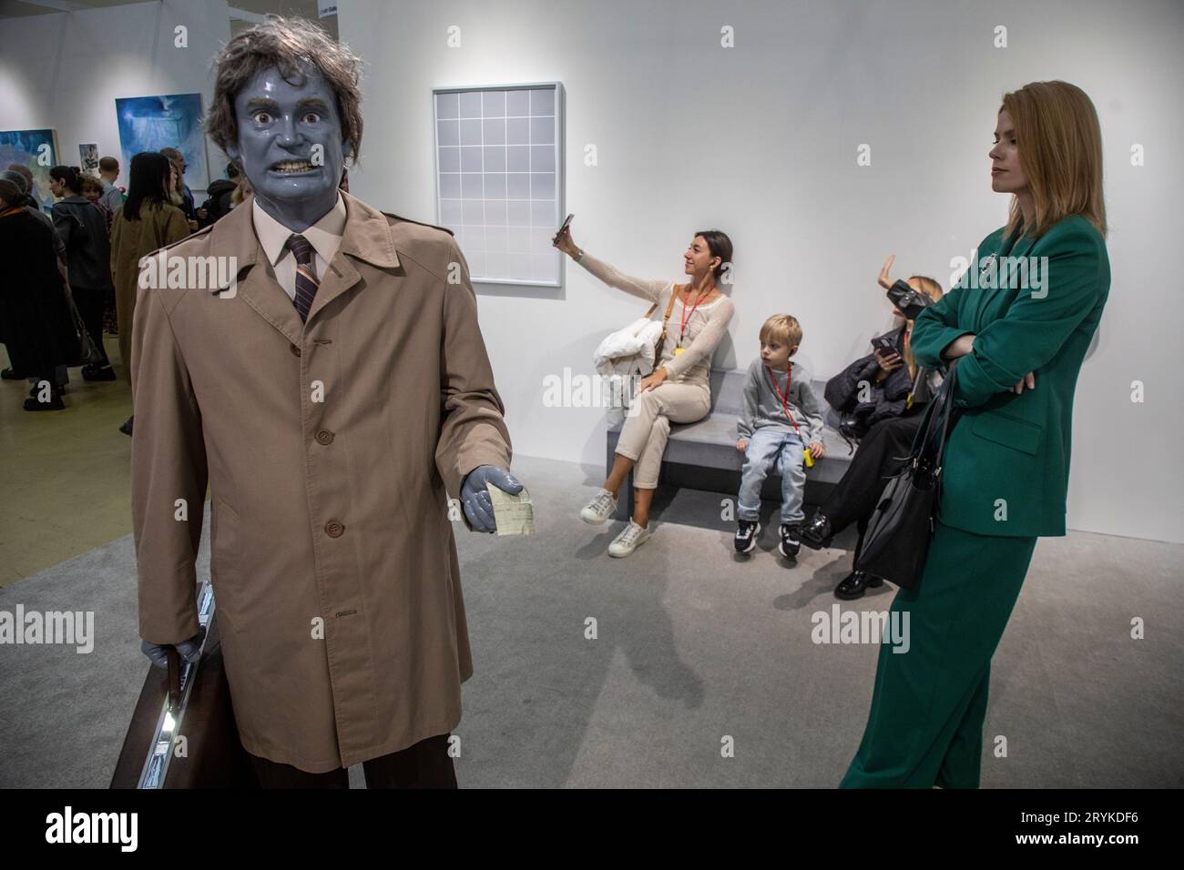 Moscow, Russia. 1st of October, 2023. Visitors look at paintings at the