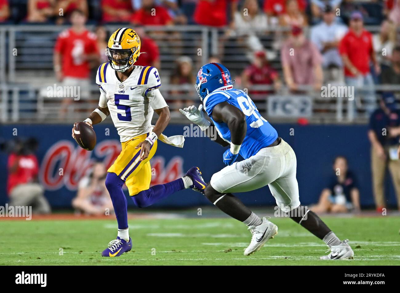 OXFORD, MS SEPTEMBER 30 LSU quarterback Jayden Daniels (5) rolls out