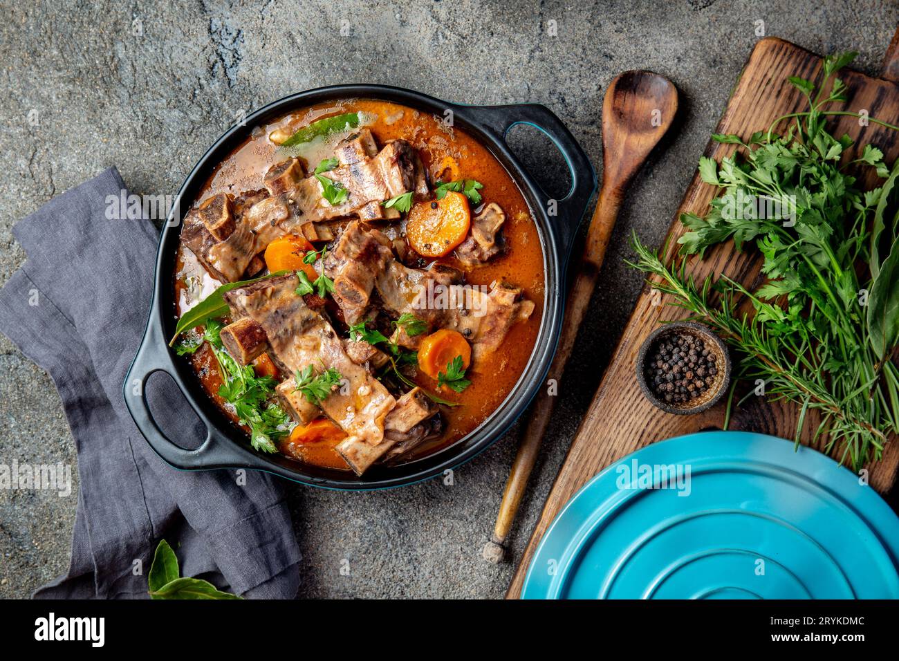 Beef ribs Bourguignon. Beef ribs stewed with carrot, onion in red wine. France dish Stock Photo