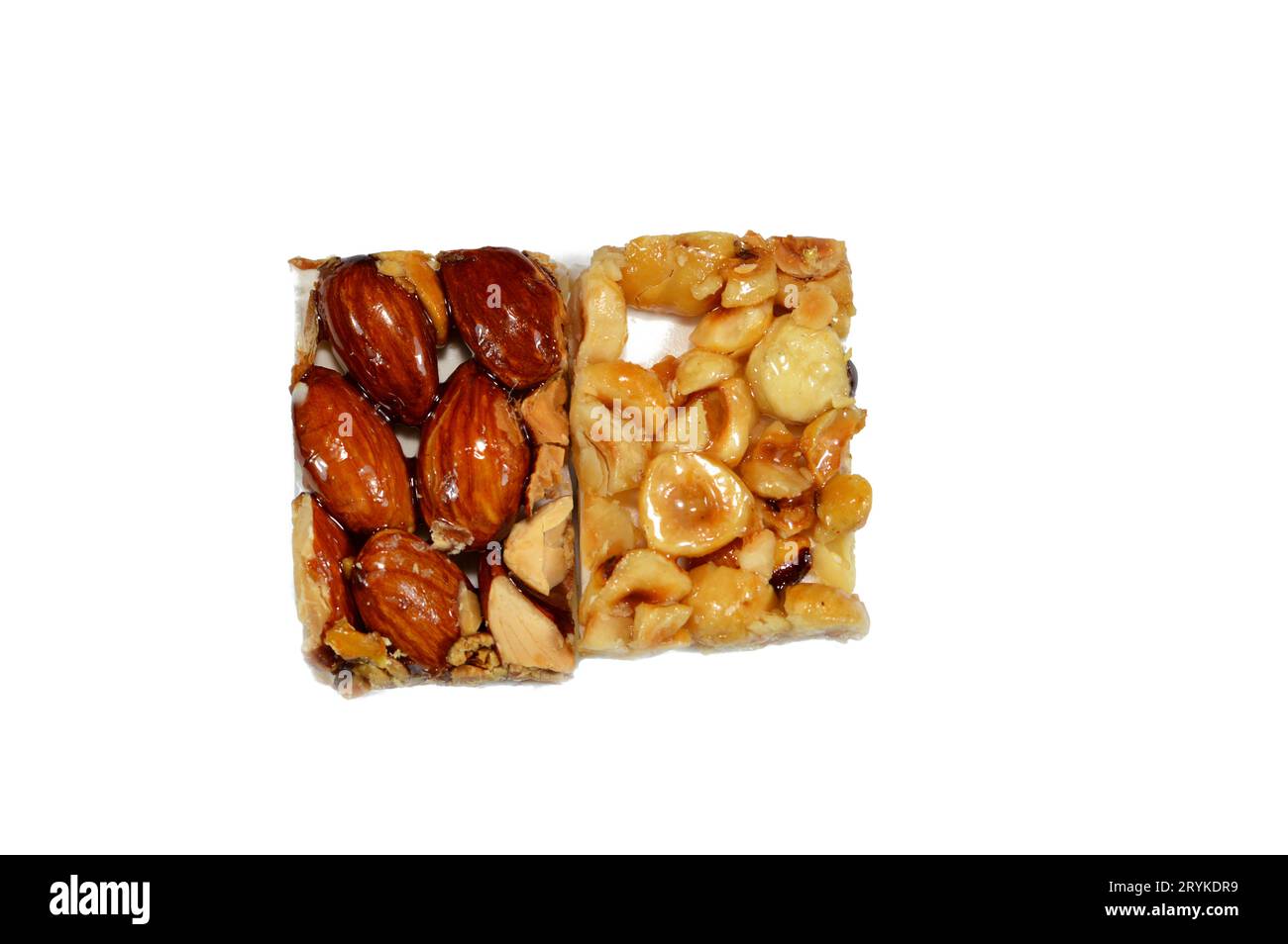 Background of Hazelnuts and roasted almonds on top of Arabic sweet