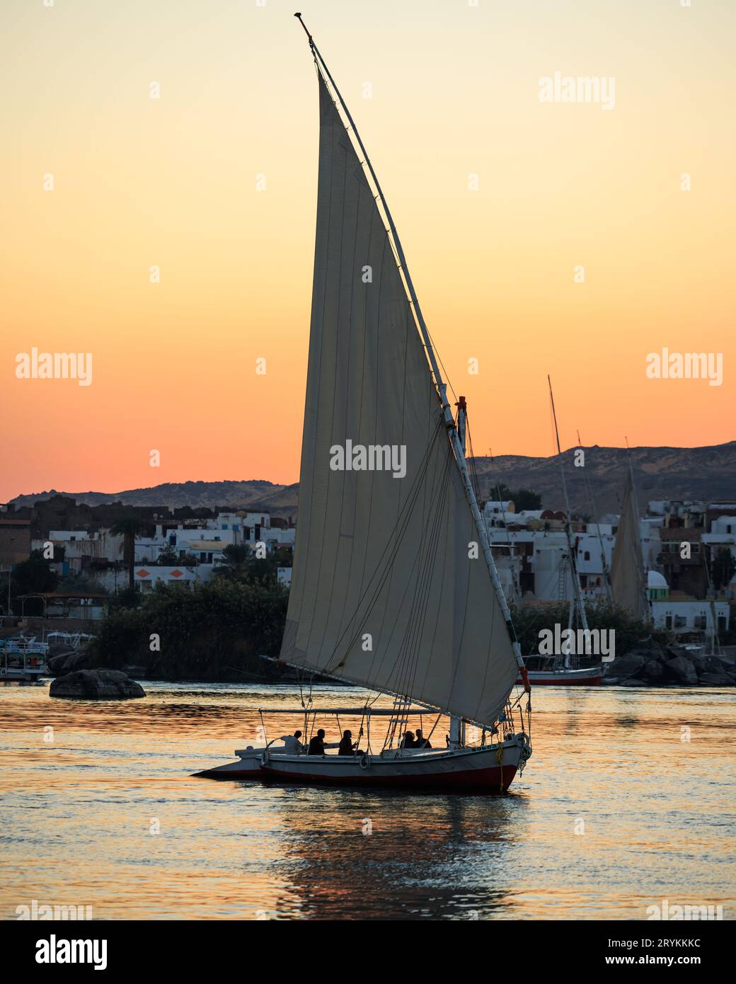 Felucca at dusk on Nile river in Aswan - Egypt Stock Photo - Alamy
