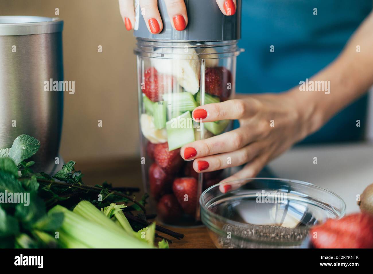 Close-up of a glass blender bowl filled with berries Stock Photo