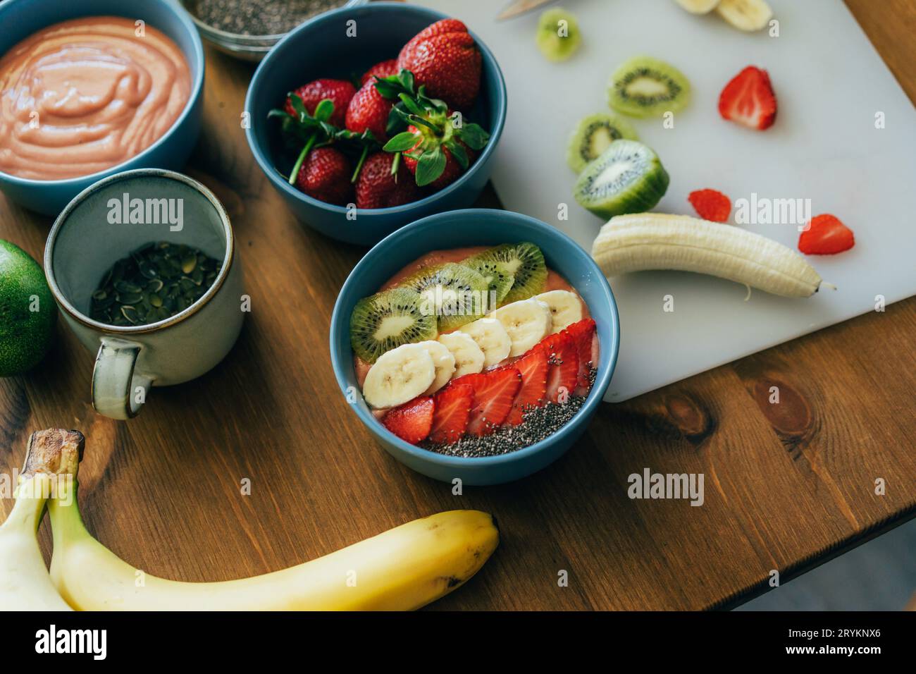 Bowls with ground fruit and berry healthy smoothies. Readymade dessert