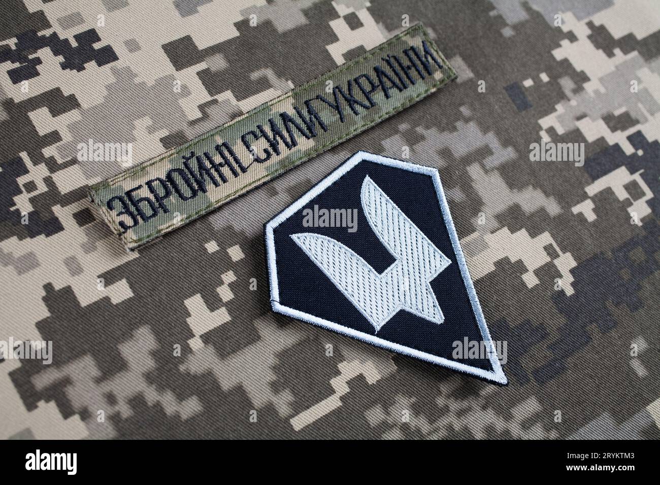 KYIV, UKRAINE - October 6, 2022. Russian invasion in Ukraine 2022. The Special Operations Forces of Ukraine Army uniform insignia badges on camouflage Stock Photo