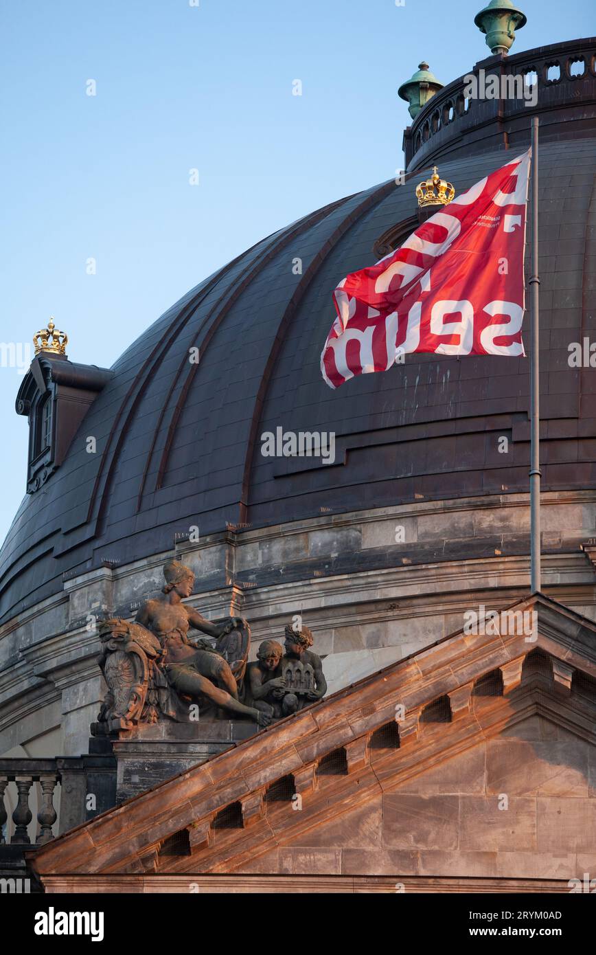 Red flag in front of the dome of the Bode Museum, Am Kupfergraben, 10178 Berlin, Germany Stock Photo