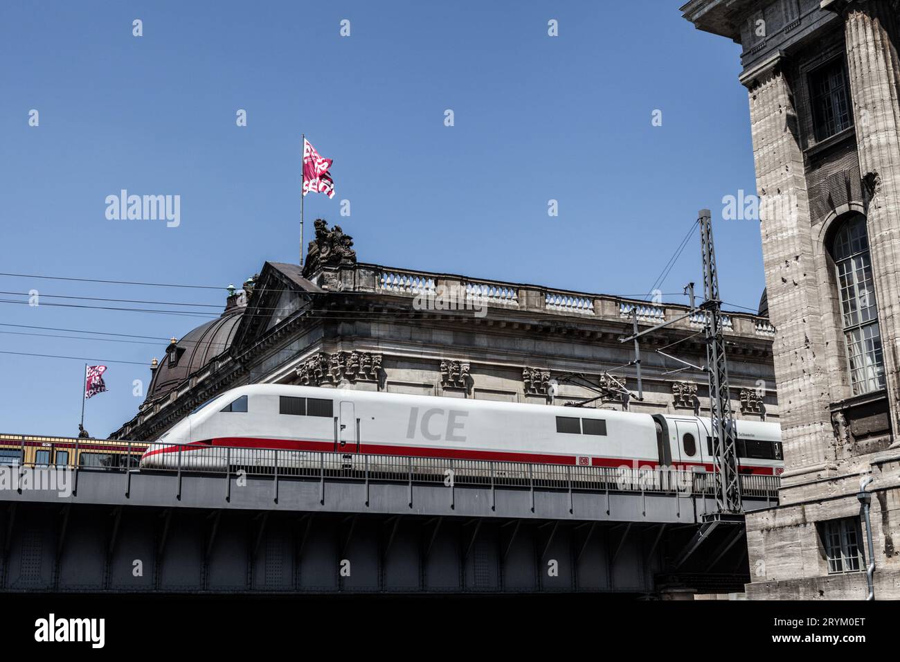 An ICE high speed train passes in front of the Bode Museum, Berlin, Germany Stock Photo