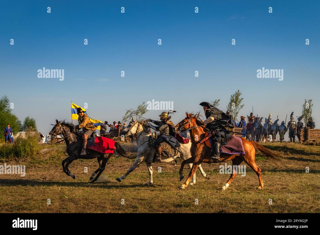 Polish Hussar chasing Swedish warrior on a battlefield. Historical ...