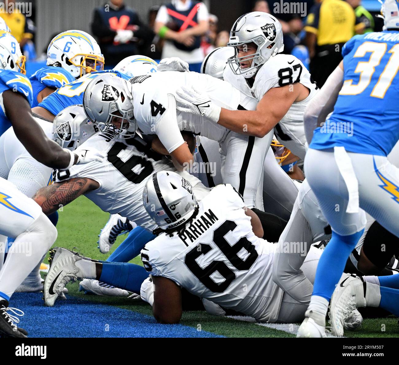 Inglewood, United States. 01st Oct, 2023. Las Vegas Raiders quarterback Aiden O'Connell (4) is pushed into the endzone by teammate Michael Mayer(87) against the Los Angeles Chargers at SoFi Stadium on Sunday, October 1, 2023 in Inglewood, California. Photo by Jon SooHoo/UPI Credit: UPI/Alamy Live News Stock Photo