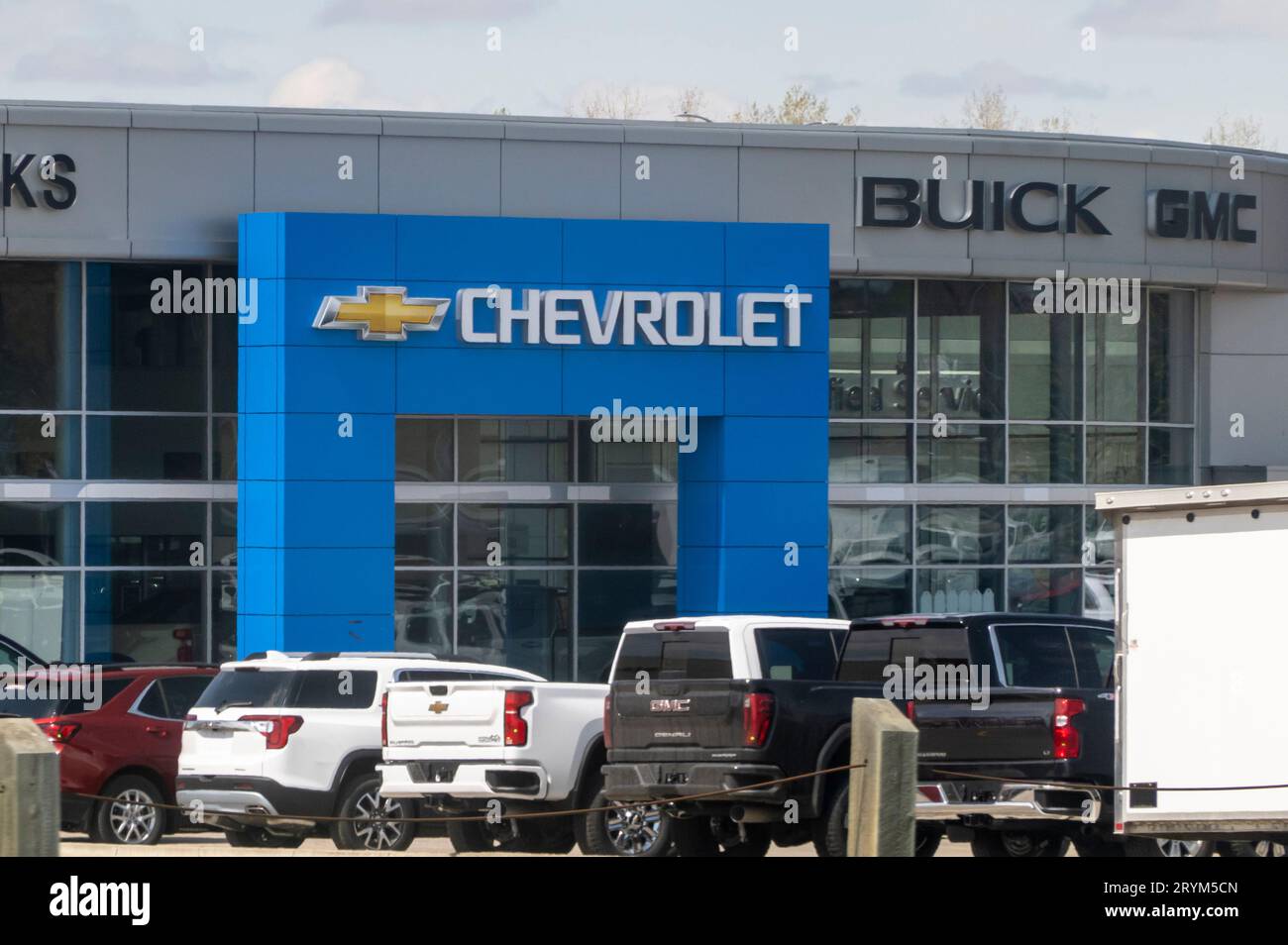 Okotoks, Alberta, Canada. May 7, 2023. A Chevrolet car dealership entrance. Stock Photo