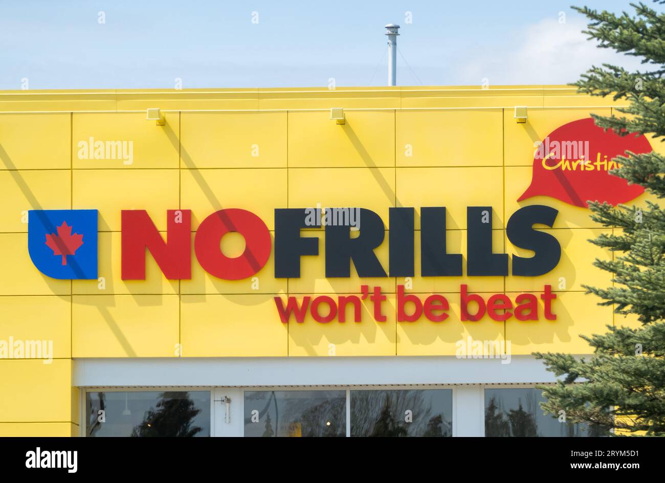 Okotoks, Alberta, Canada. May 8, 2023. A close up to a No Frills sign