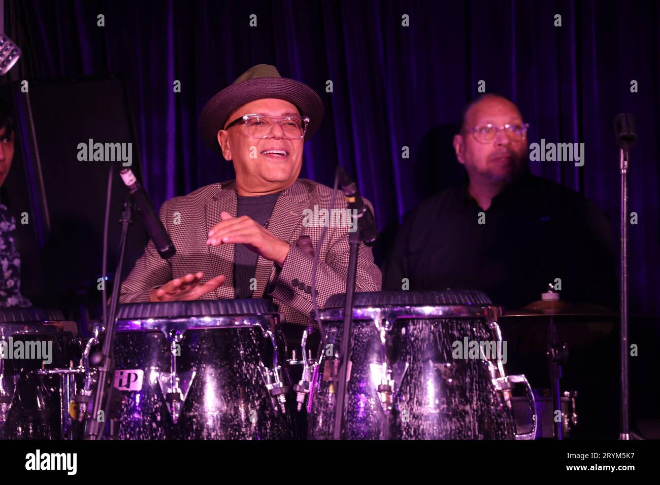 Band continues under hi-res stock photography and images - Alamy