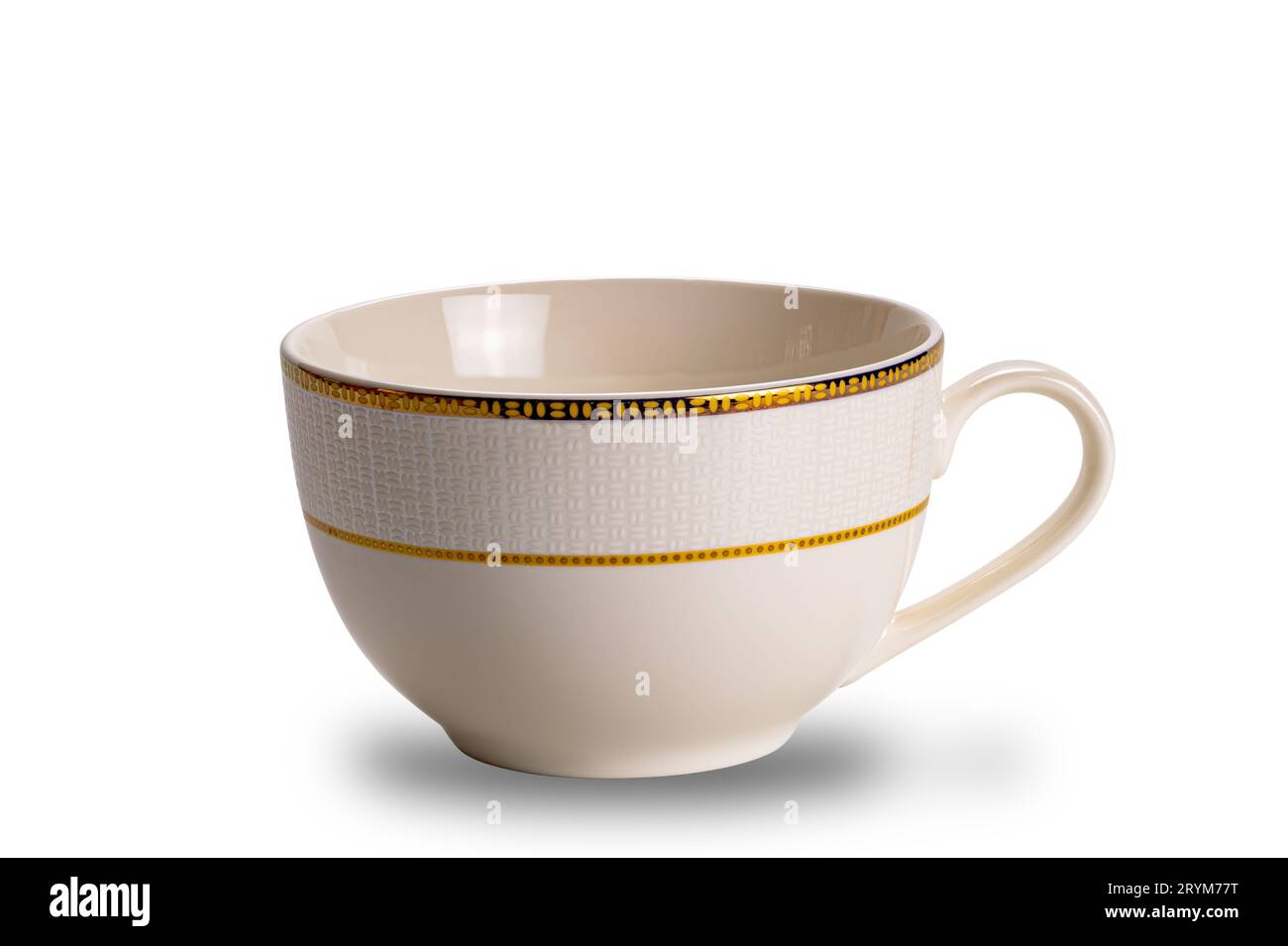 Empty brown ceramic coffee cup with golden pattern decorated edge isolated on white background. Stock Photo