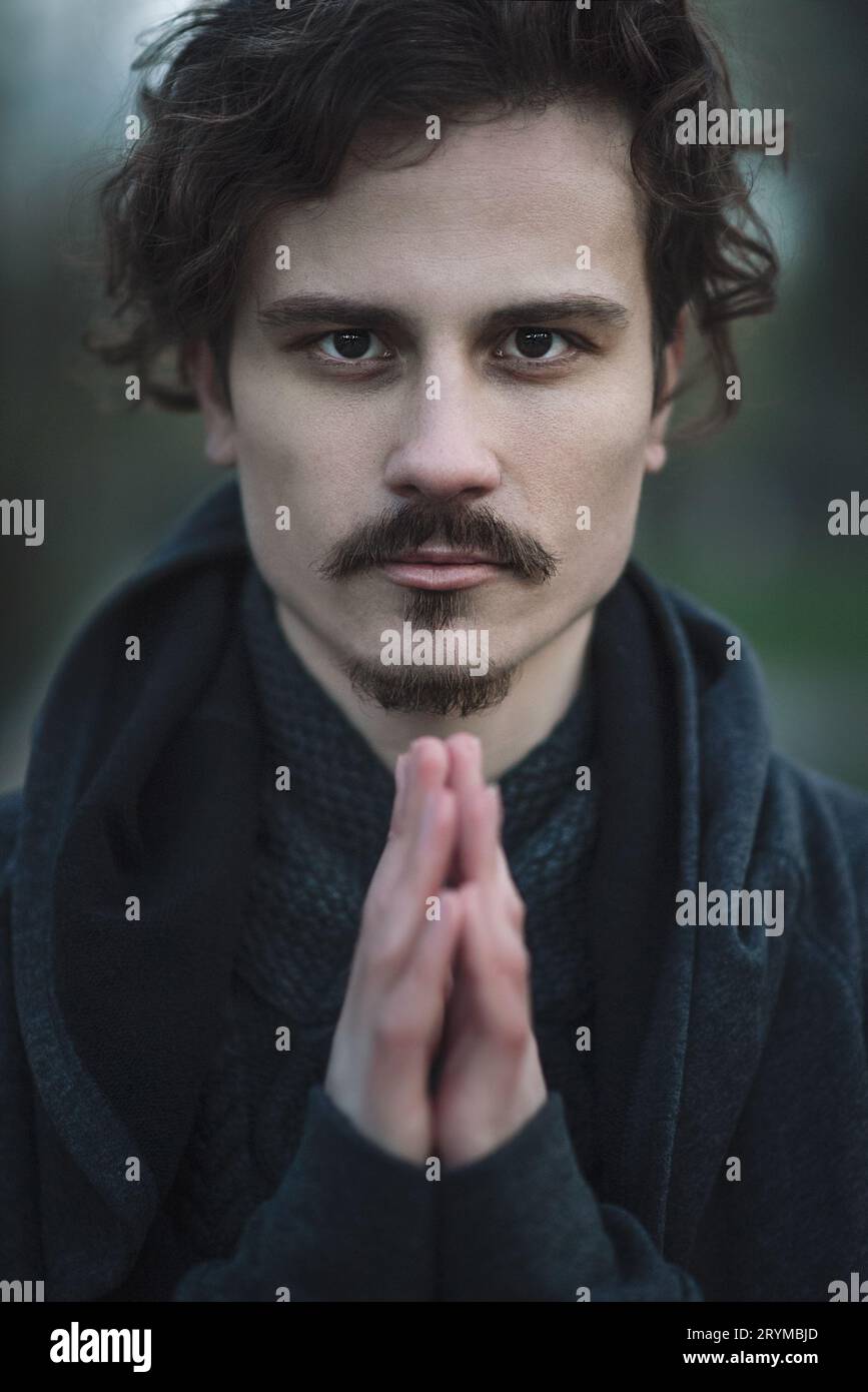 Young curly man hi-res stock photography and images - Alamy