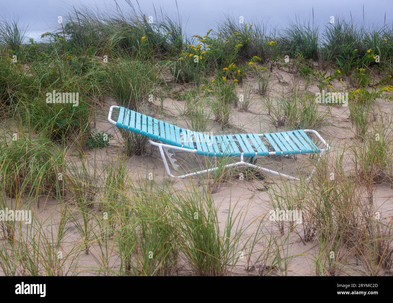 Old lounge chair on the beach in Amagansett, NY Stock Photo Alamy