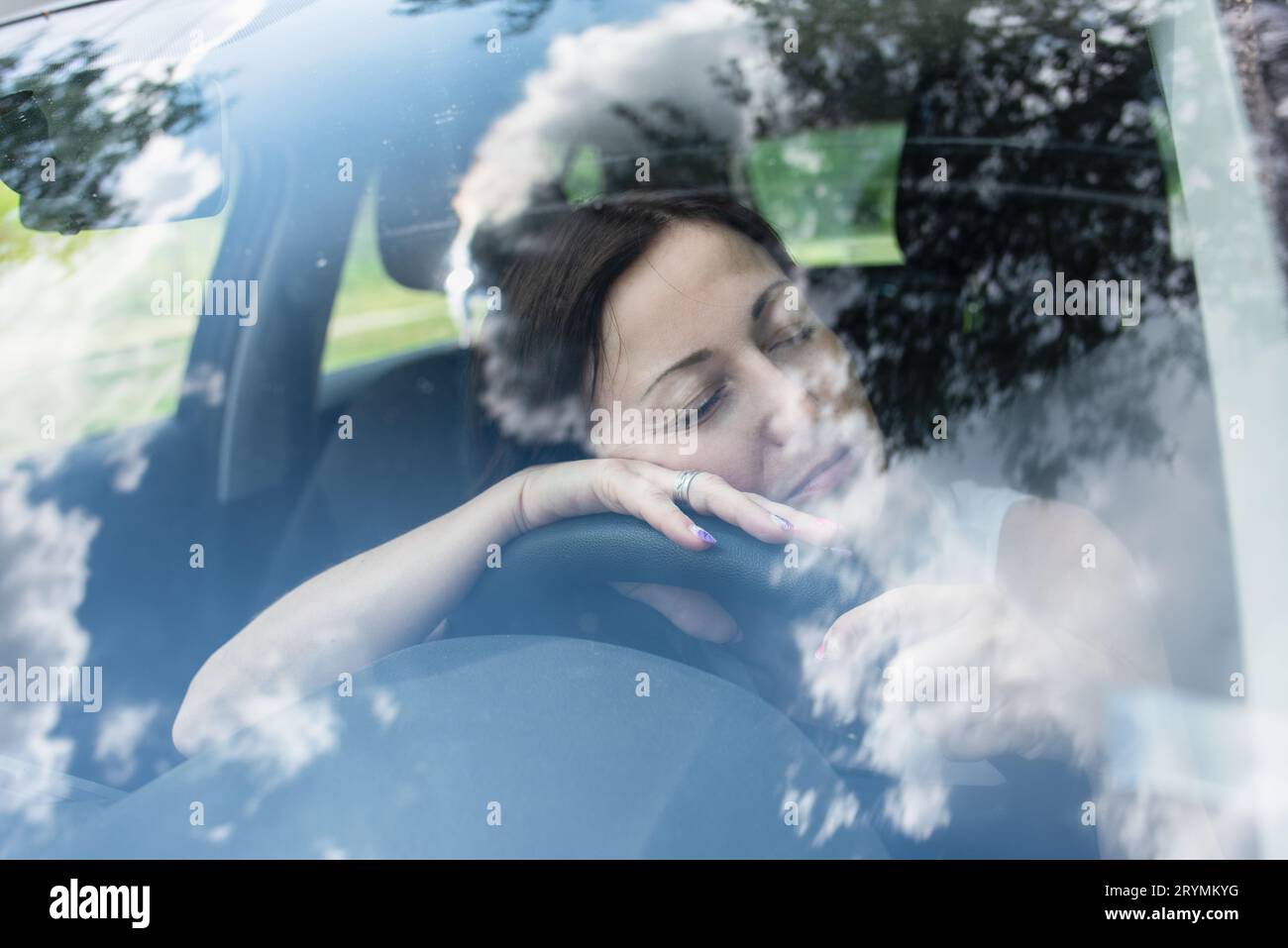 Woman falling asleep driving hires stock photography and images Alamy