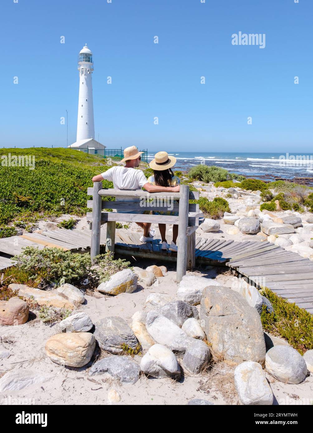 Couple man and women visiting the lighthouse of Slangkop Kommetjie Cape Town South Africa Stock Photo