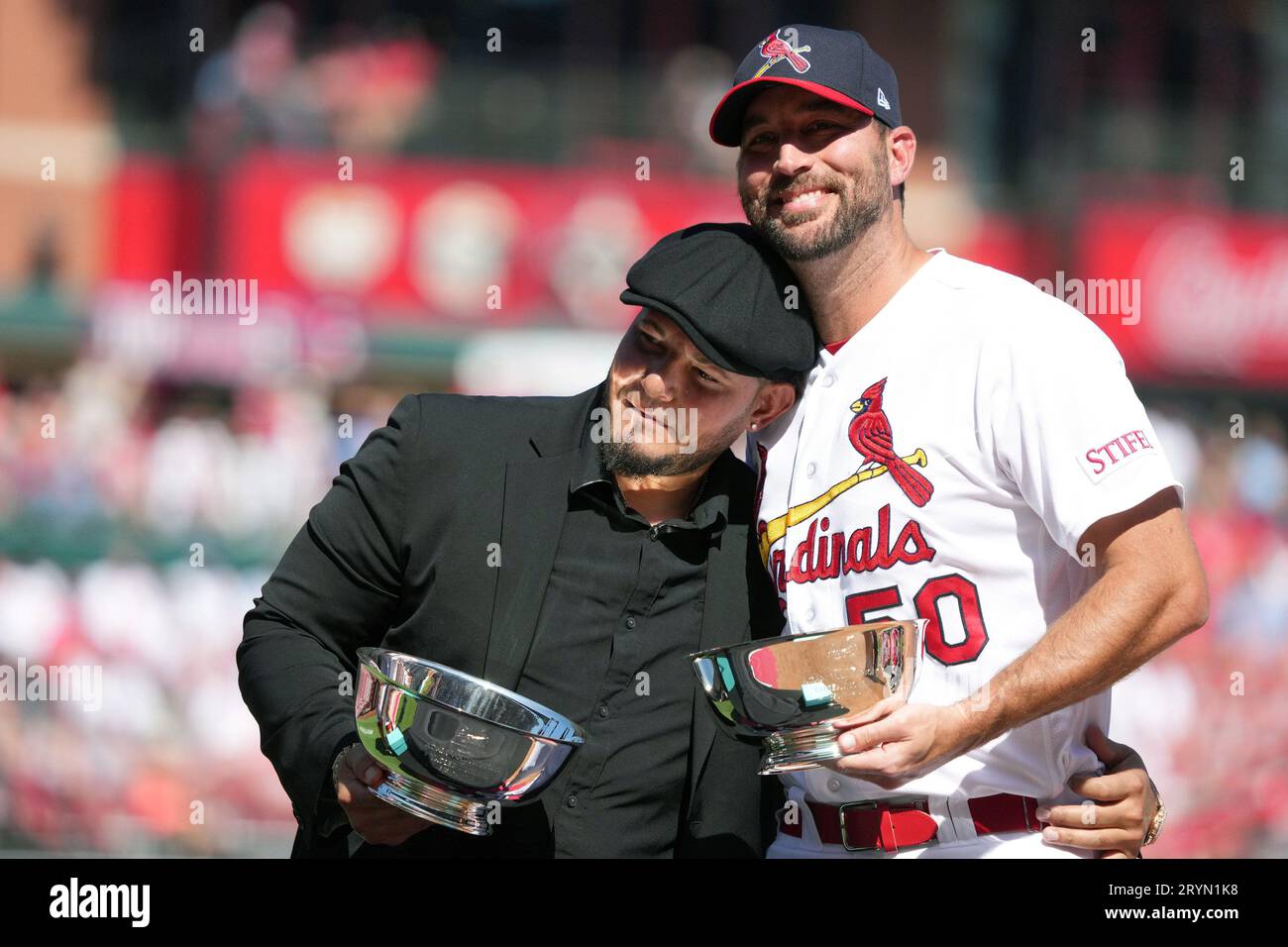 former-st-louis-cardinals-battery-mates-adam-wainwright-r-and-former