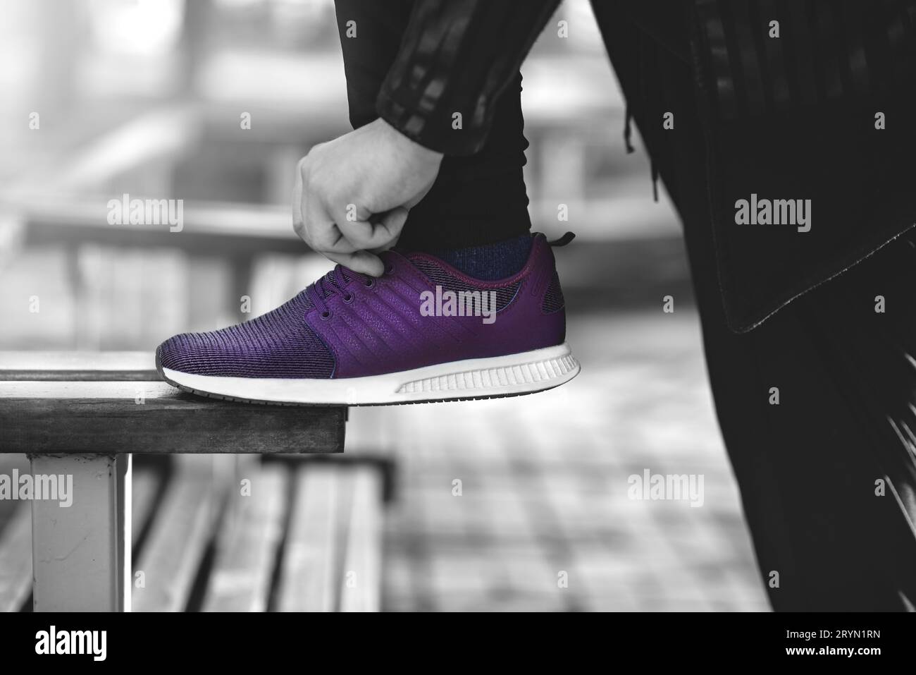 Close up of man sneakers on street Stock Photo