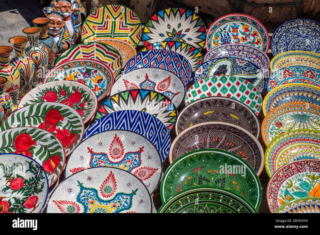 Decorative ceramic plates with traditional uzbek ornament in the street ...